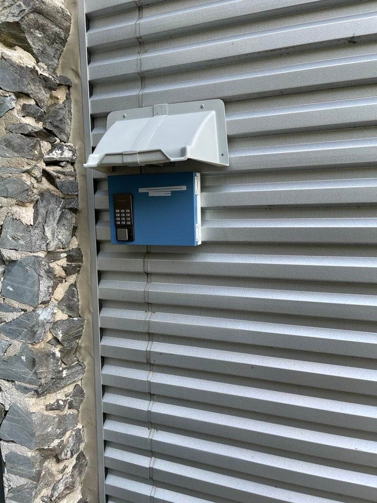 Electric Meter Rain Hoods and Shields mounted above a tele-entry unit.