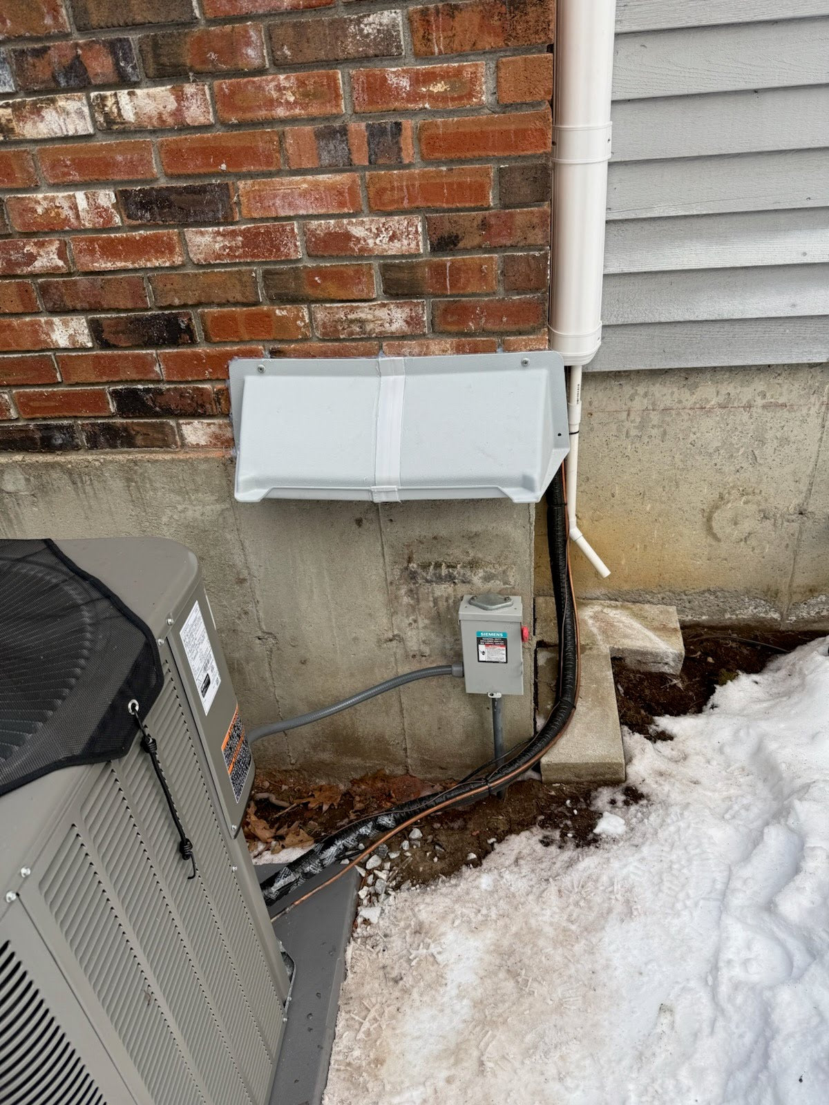 Electric meter rain hood made of durable ABS plastic, surface mounted for protecting electric panels from water damage.