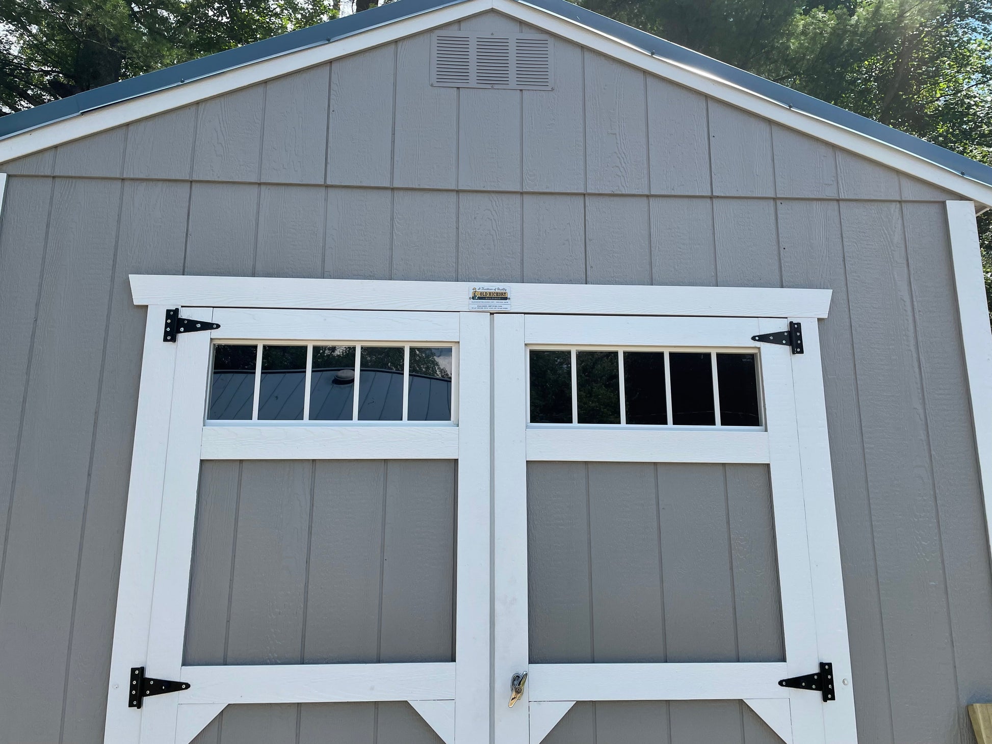 Extended width shed door rain guard preventing double door leak and water damage