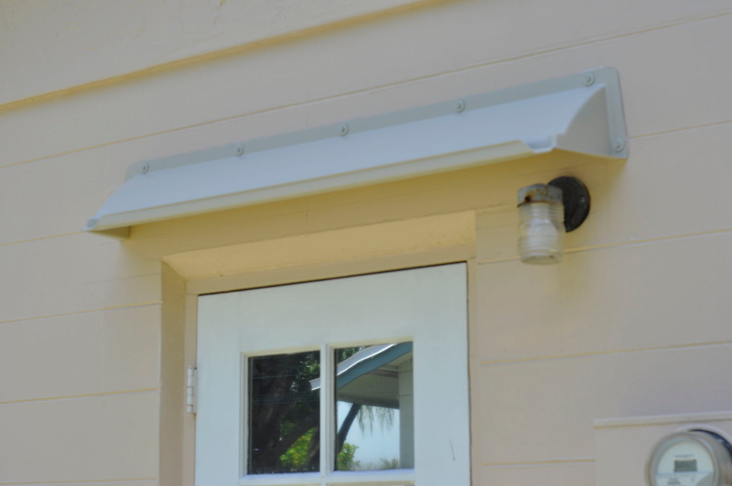 Rain Diverter Over Door - Stops Water Leaking From Above Doors With Insufficient Overhang Protection. STANDARD WIDTH 52 inch