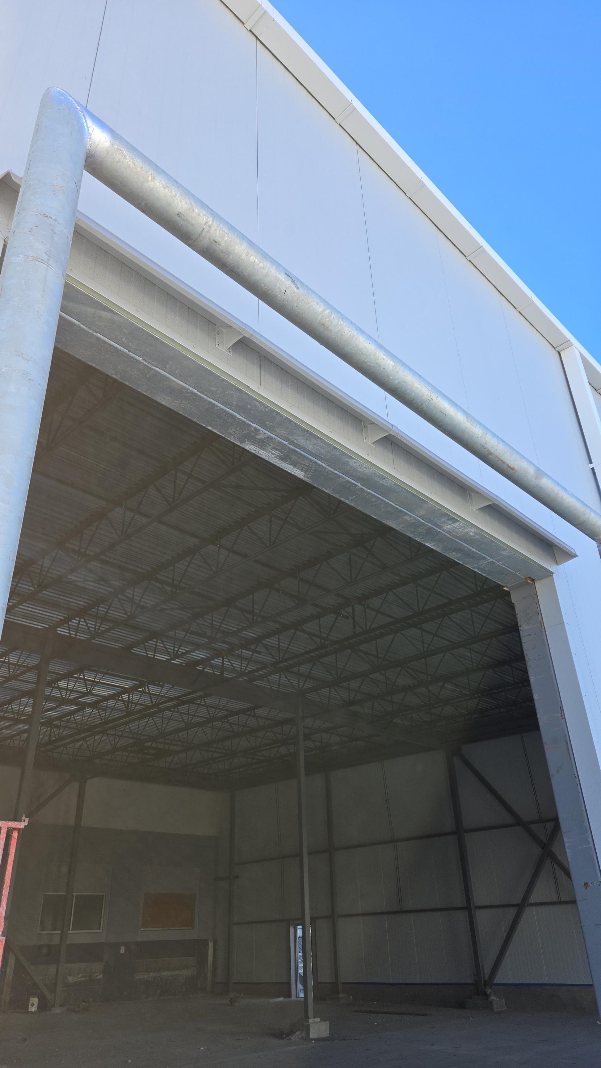 Garage door rain diverter with extended width, UV-protected ABS plastic, mounted to route water away and prevent dripping, ideal to fix leaking windows.